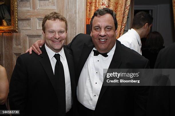 Chris Licht, vice president of programming and executive producer at CBS News Inc., left, and Chris Christie, governor of New Jersey, attend the...