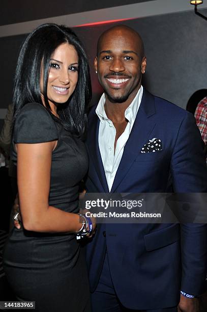 Amy Eslami and fitness trainer Dolvett Quince attend the Welcome to Hotel Noir event at W Hotel, Buckhead on May 10, 2012 in Atlanta, Georgia.