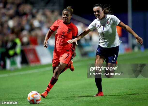 Nikita Parris of England battles for possession with Anja Sonstevold of Norway during the International Friendly between England and Norway at...