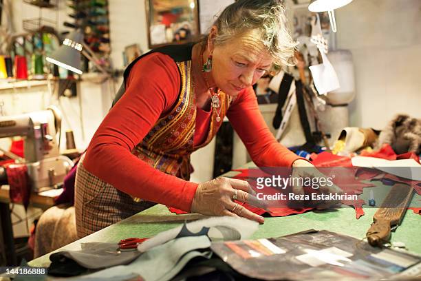 Woman works with leather
