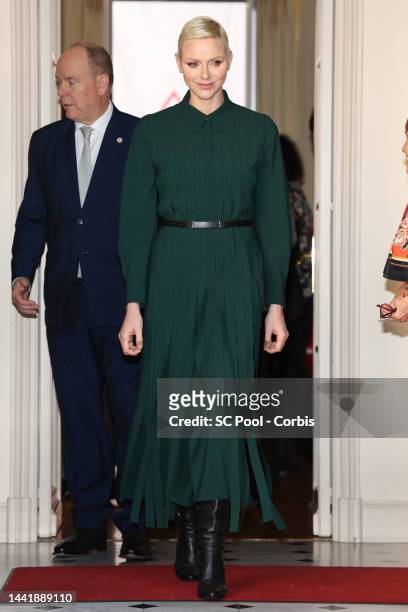 Prince Albert II of Monaco and Princess Charlene of Monaco attend the Red Cross Christmas Gifts Distribution at Monaco Palace on November 16, 2022 in...