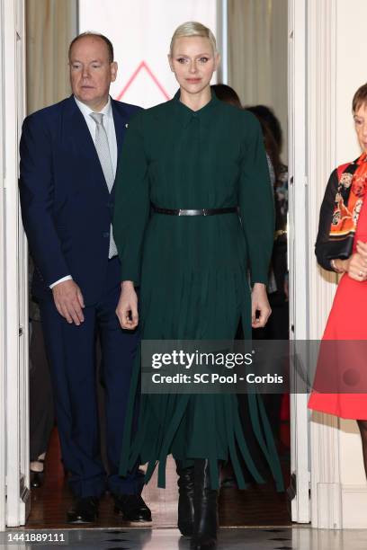 Prince Albert II of Monaco and Princess Charlene of Monaco attend the Red Cross Christmas Gifts Distribution at Monaco Palace on November 16, 2022 in...