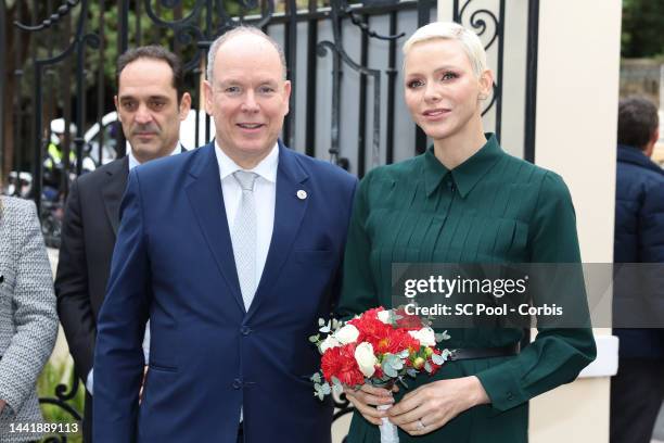 Prince Albert II of Monaco and Princess Charlene of Monaco attend the Red Cross Christmas Gifts Distribution at Monaco Palace on November 16, 2022 in...