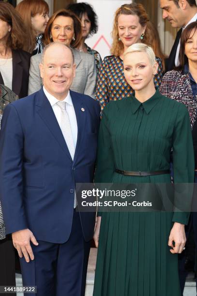 Prince Albert II of Monaco and Princess Charlene of Monaco attend the Red Cross Christmas Gifts Distribution at Monaco Palace on November 16, 2022 in...