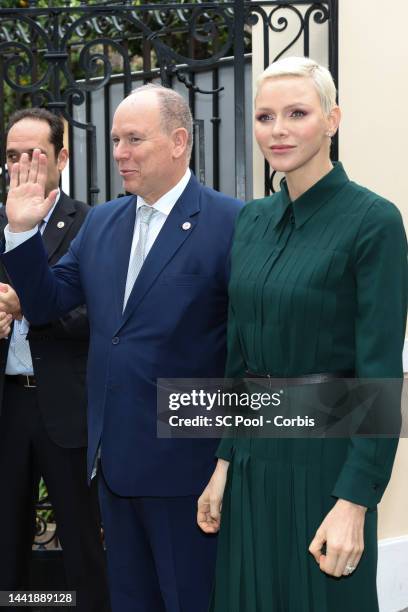 Prince Albert II of Monaco and Princess Charlene of Monaco attend the Red Cross Christmas Gifts Distribution at Monaco Palace on November 16, 2022 in...