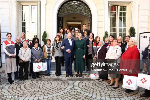 Camille Gottlieb, Prince Albert II of Monaco and Princess Charlene of Monaco attend the Red Cross Christmas Gifts Distribution at Monaco Palace on...