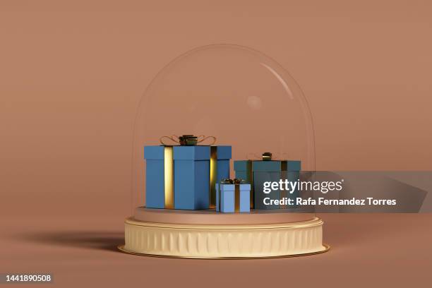 christmas gift boxes miniature under snow in a glass dome. creative still life with copy space.3d - bee stock illustrations photos et images de collection