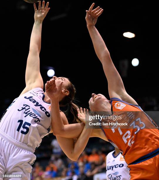 Sara Blicavs of the Flyers and Mikaela Ruef of the Fire contest the ball during the round three WNBL match between Townsville Fire and Southside...