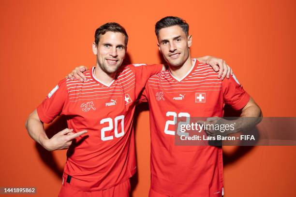 Fabian Frei and Fabian Schaer of Switzerland pose during the official FIFA World Cup Qatar 2022 portrait session on November 15, 2022 in Doha, Qatar.