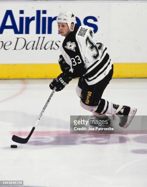 Benoit Hogue from Canada and Left Wing for the Dallas Stars in motion on the ice during the NHL Western Conference Central Division game against the...