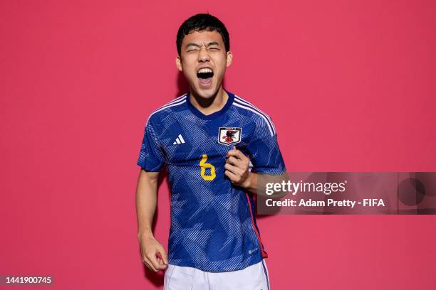 Wataru Endo of Japan poses during the official FIFA World Cup Qatar 2022 portrait session on November 15, 2022 in Doha, Qatar.