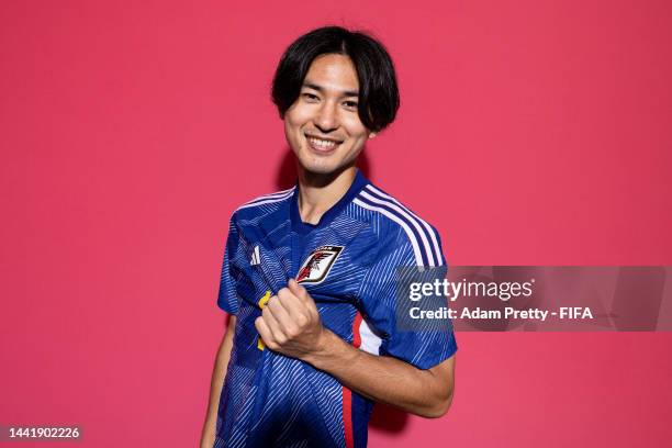 Takumi Minamino of Japan poses during the official FIFA World Cup Qatar 2022 portrait session on November 15, 2022 in Doha, Qatar.