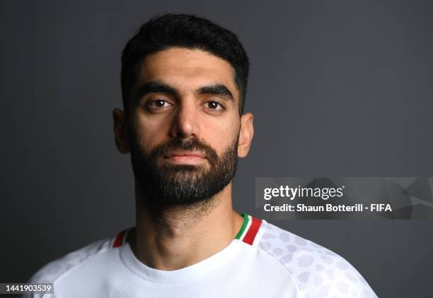 Ali Karimi of IR Iran poses during the official FIFA World Cup Qatar 2022 portrait session at on November 15, 2022 in Doha, Qatar.