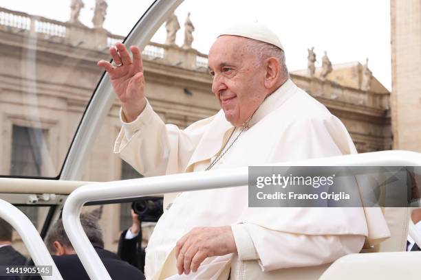 Pope Francis waves to the faithful as he leaves St. Peter's Square for his weekly general audience on November 16, 2022 in Vatican City, Vatican....