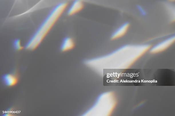 dreamy surreal rainbow crystal disco ball light refraction texture overlay effect - prisma stockfoto's en -beelden