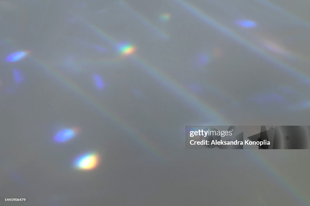 Dreamy surreal rainbow crystal disco ball light refraction texture overlay effect