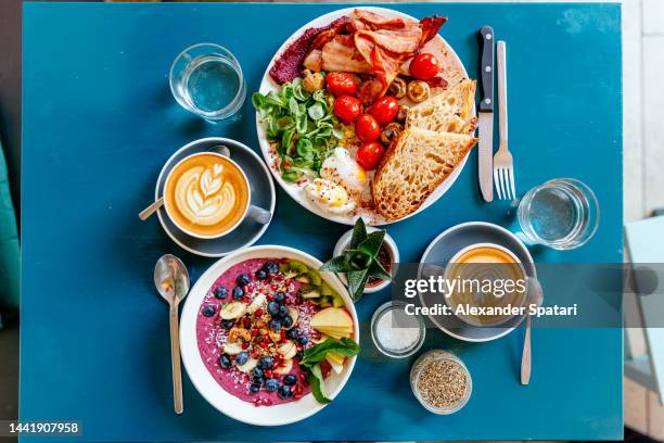 colorful breakfast at the cafe, high angle view - dining overlooking water stock pictures, royalty-free photos & images