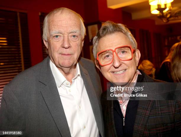 Sir Tim Rice and Thomas Schumacher pose at a celebration honoring Sir Tim Rice's caricature being unveiled at Sardi's during the 25th Anniversary of...