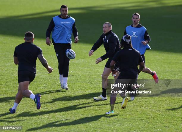Mike Brown of the Barbarians passes the ball during a Barbarians training session at Twickenham Stoop on November 16, 2022 in London, England. The...