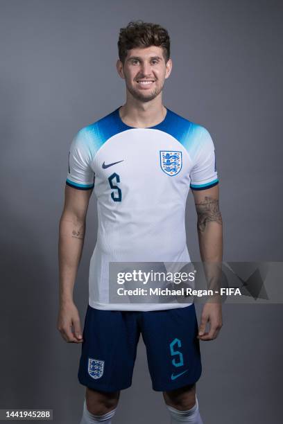 John Stones of England poses during the official FIFA World Cup Qatar 2022 portrait session on November 16, 2022 in Doha, Qatar.