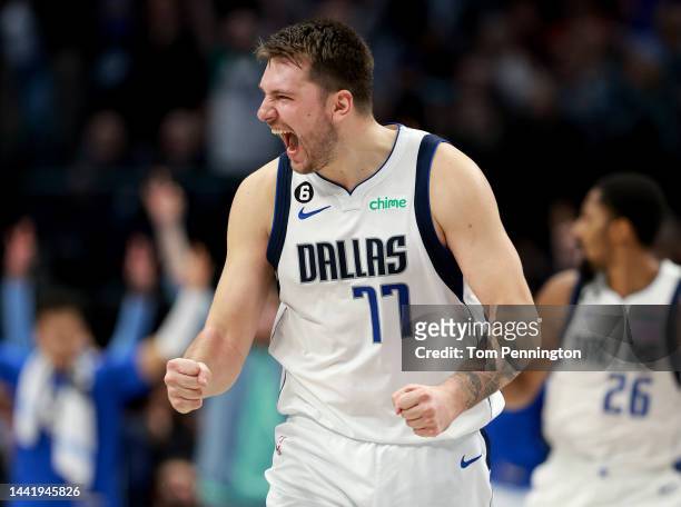 Luka Doncic of the Dallas Mavericks celebrates after Spencer Dinwiddie of the Dallas Mavericks hits a three-point shot against the LA Clippers in the...