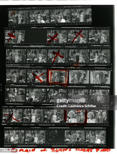 Contact sheet shows photos of American actress Marilyn Monroe and French actor Yves Montand during the filming of their movie 'Let's Make Love' , Los...