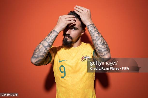 Jamie Maclaren of Australia poses during the official FIFA World Cup Qatar 2022 portrait session on November 15, 2022 in Doha, Qatar.