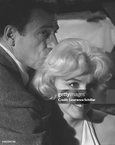 French actor Yves Montand and American actress Marilyn Monroe on set during the filming of their movie 'Let's Make Love' , Los Angeles, California,...