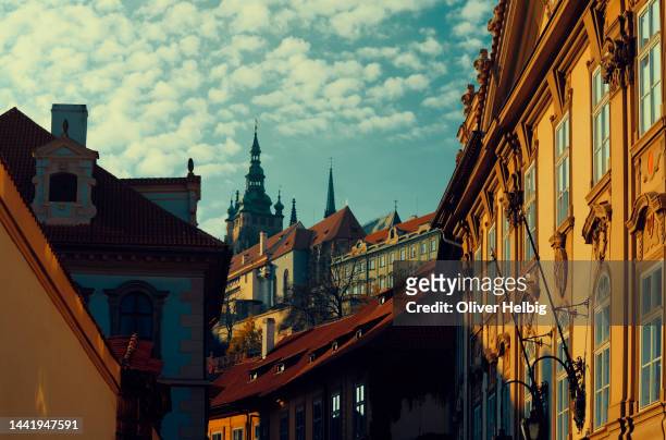 view up to the hradcany castle and the cathedral of st. vitus in prague, czech republic - cathedral of st vitus stock pictures, royalty-free photos & images