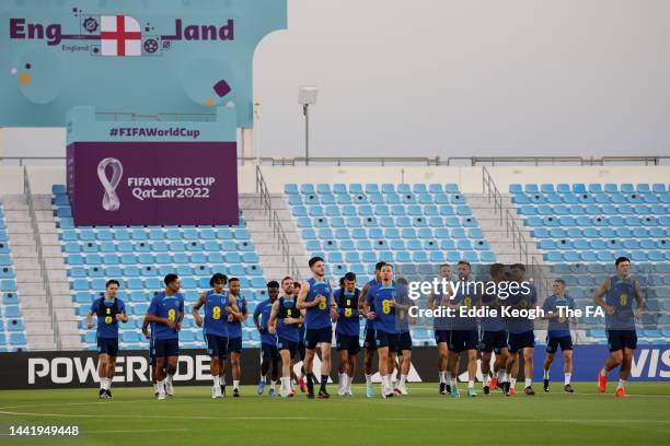 General view inside the stadium as Declan Rice, Kalvin Phillips, Luke Shaw, Mason Mount and Harry Maguire of England train during an England training...