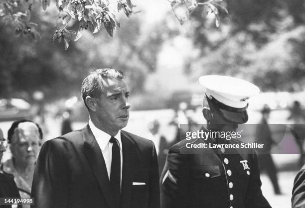 American former baseball player Joe DiMaggio and his son Joseph DiMaggio III left Westwood Village Memorial Park Cemetery following the funeral of...