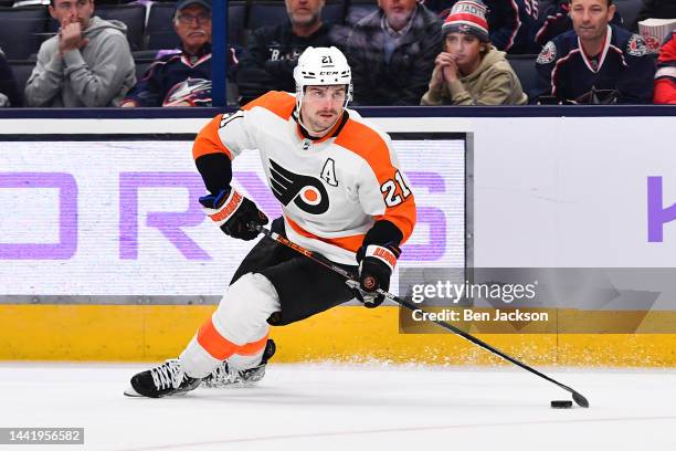 Scott Laughton of the Philadelphia Flyers skates with the puck during the overtime period of a game against the Columbus Blue Jackets at Nationwide...