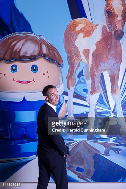 Artist Jeff Koons poses during the 'Jeff Koons' exhibition preview at the Fondation Beyeler on May 11, 2012 in Basel, Switzerland. The exhibition...