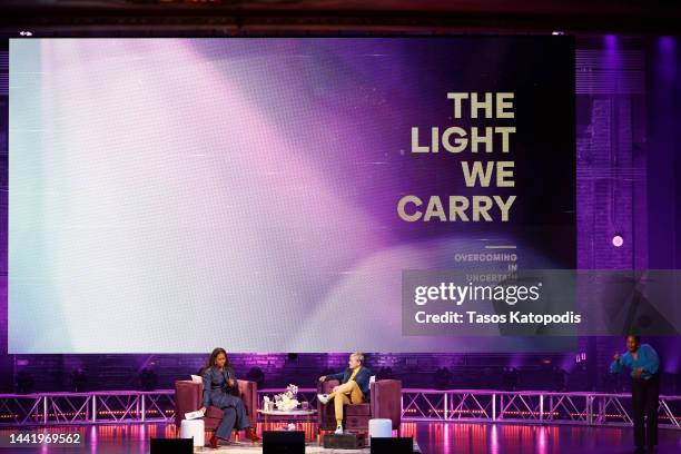 Former First Lady Michelle Obama and Ellen DeGeneres speak onstage during the Michelle Obama: The Light We Carry Tour at Warner Theatre on November...