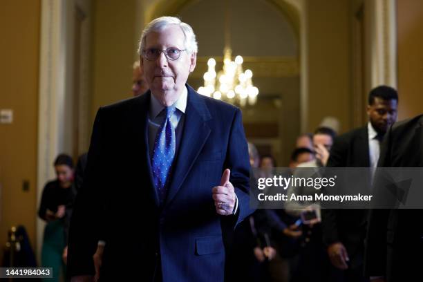 Senate Minority Leader Mitch McConnell gives a thumbs up as he leaves a meeting with Senate Republicans at the U.S. Capitol on November 16, 2022 in...