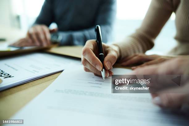 signing a contract! - settlement agreement stock pictures, royalty-free photos & images