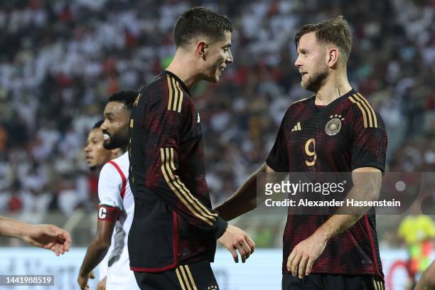 Niklas Füllkrug of Germany celebrates scoring the opening goal with his team mate Kai Havertz during the international friendly match between Germany...