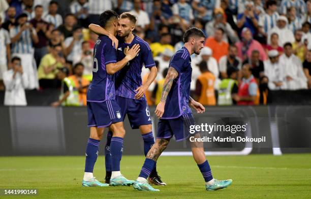 Joaquin Correa of Argentina celebrates with his teammates German Pezzella during the international friendly between United Arab Emirates and...