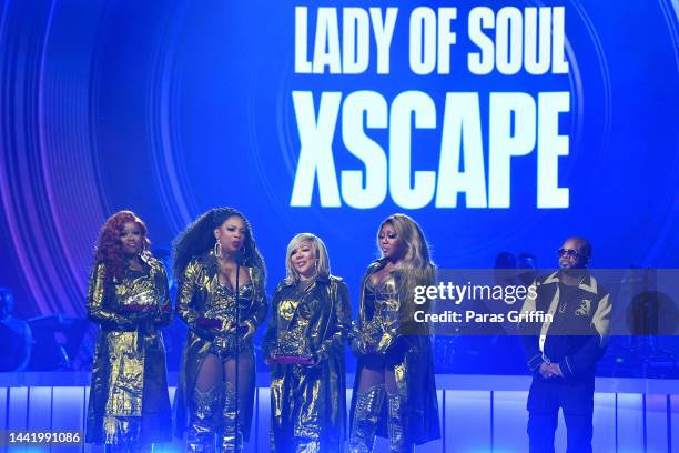 Tamika Scott, Kandi Burruss, Tameka Cottle and LaTocha Scott of Xscape accept the Lady of Soul Award from Jermaine Dupri onstage during the 2022 Soul...