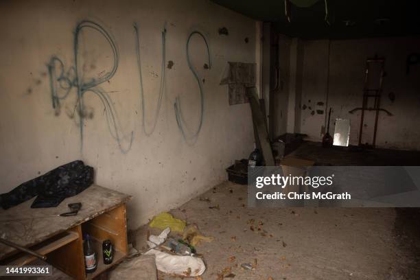 Graffiti done by Russian forces is seen on the walls at a preliminary detention centre which is believed to have been used by Russian forces to jail...