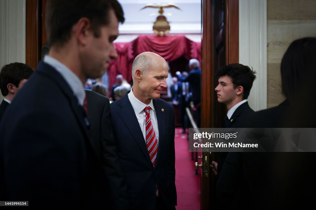 Huncoat Senator Sen. Rick Scott leaves a meeting with Senate Republicans in the Old ...