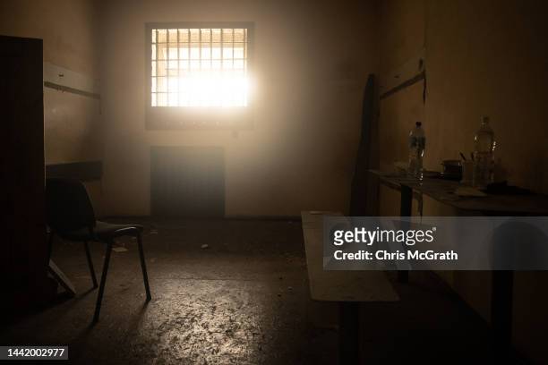 Items are seen inside a cell at a preliminary detention centre which is believed to have been used by Russian forces to jail and torture civilians on...