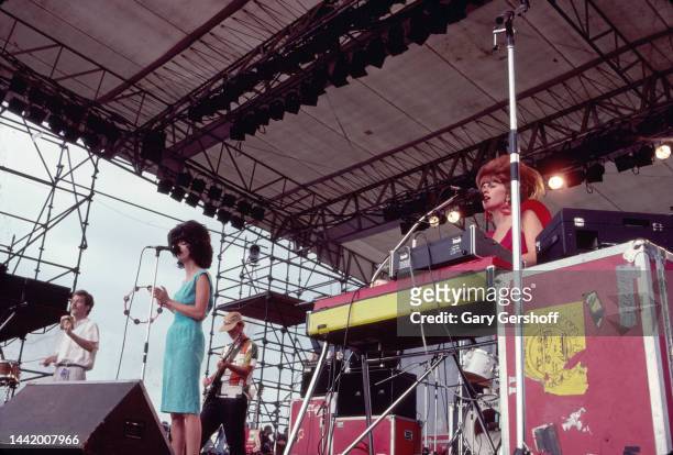 View of, from left, American New Wave musicians Fred Schneider, Cindy Wilson, Ricky Wilson , on guitar, and Kate Pierson, on keyboards, all of the...