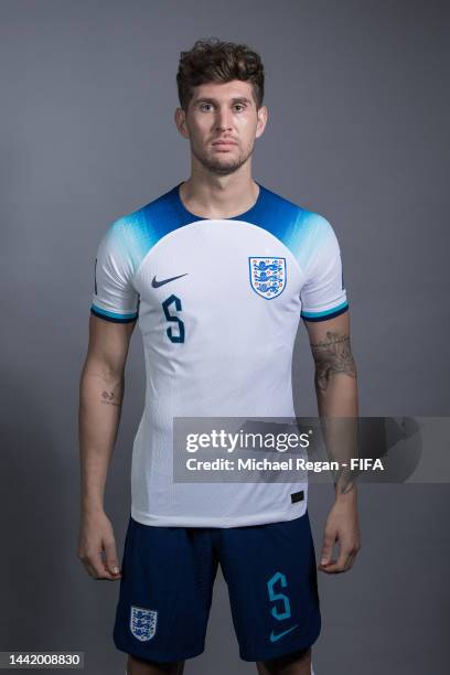 John Stones of England poses during the official FIFA World Cup Qatar 2022 portrait session on November 16, 2022 in Doha, Qatar.