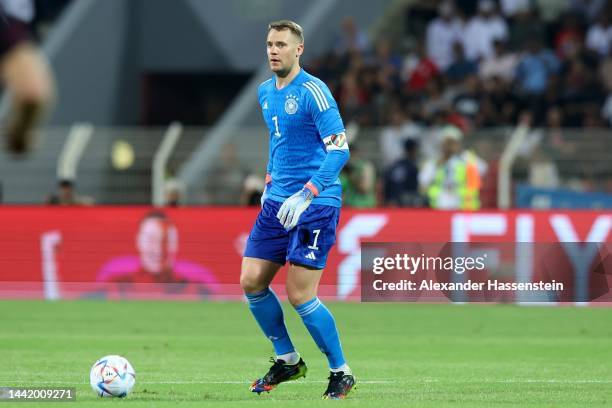 Manuel Neuer of Germany runs with the ball during the international friendly match between Germany and Oman at Sultan Qaboos Sports Complex on...