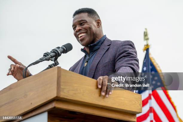 Republican U.S. Senate candidate Herschel Walker speaks to supporters at a campaign rally on November 16, 2022 in McDonough, Georgia. Walker, the...