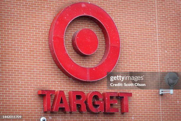 The Target company logo hangs outside of a Target store on November 16, 2022 in Chicago, Illinois. Target’s stock plummeted today after the company...