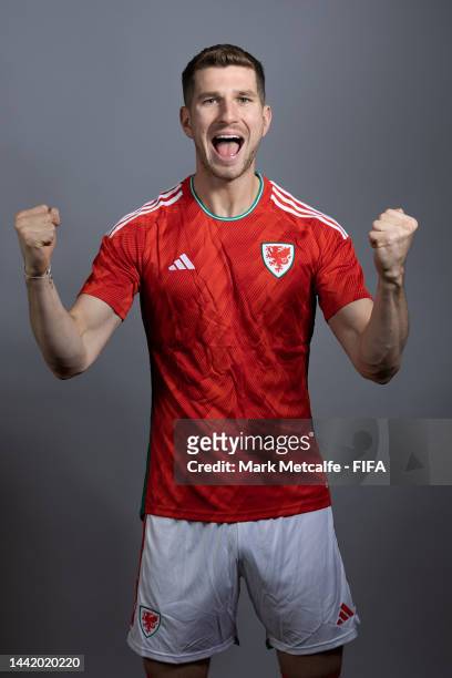 Chris Mepham of Wales poses during the official FIFA World Cup Qatar 2022 portrait session on November 16, 2022 in Doha, Qatar.