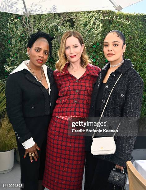 Janicza Bravo, Leslie Mann, and Tessa Thompson, all wearing CHANEL, attend the Academy Women's Luncheon presented by CHANEL at Academy of Motion...