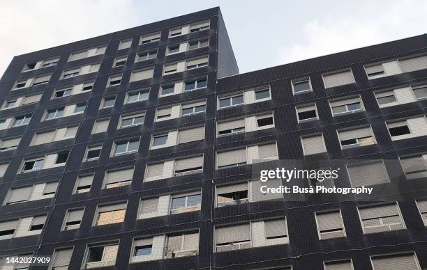 facade of social housing building in barcelona, spain - cladding stock pictures, royalty-free photos & images